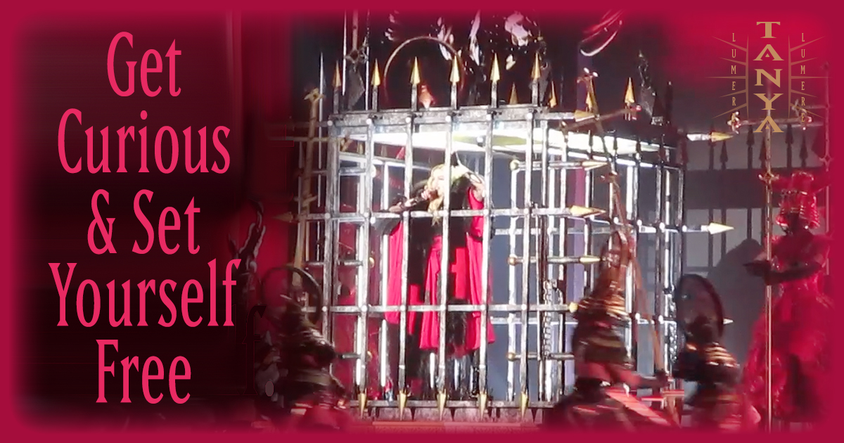 A woman stands inside a cage with the words: “Get Curious and Set Yourself Free,” representing creativity for healing.