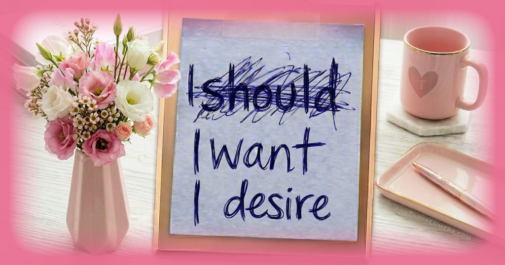 Clipboard with the note “I should” crossed out, and below it “I want” and “I desire,” for the theme: Stop Shoulding Yourself.