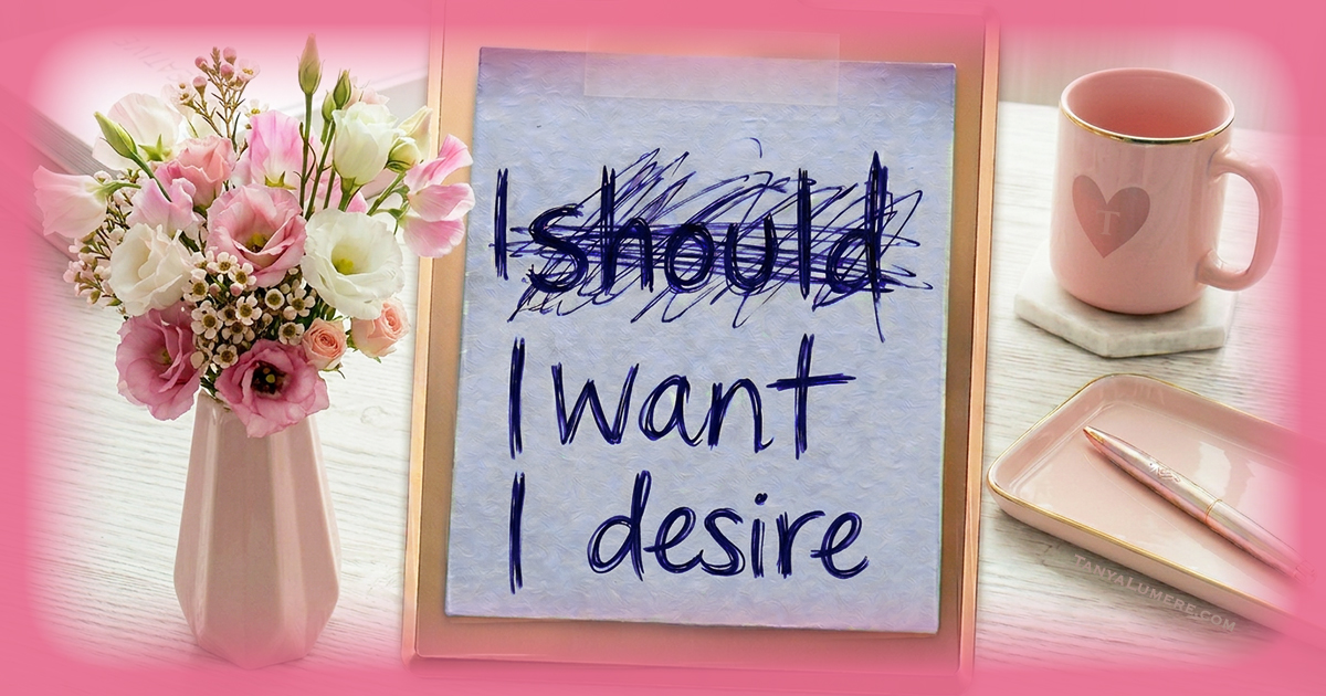Clipboard with the note “I should” crossed out, and below it “I want” and “I desire,” for the theme: Stop Shoulding Yourself.